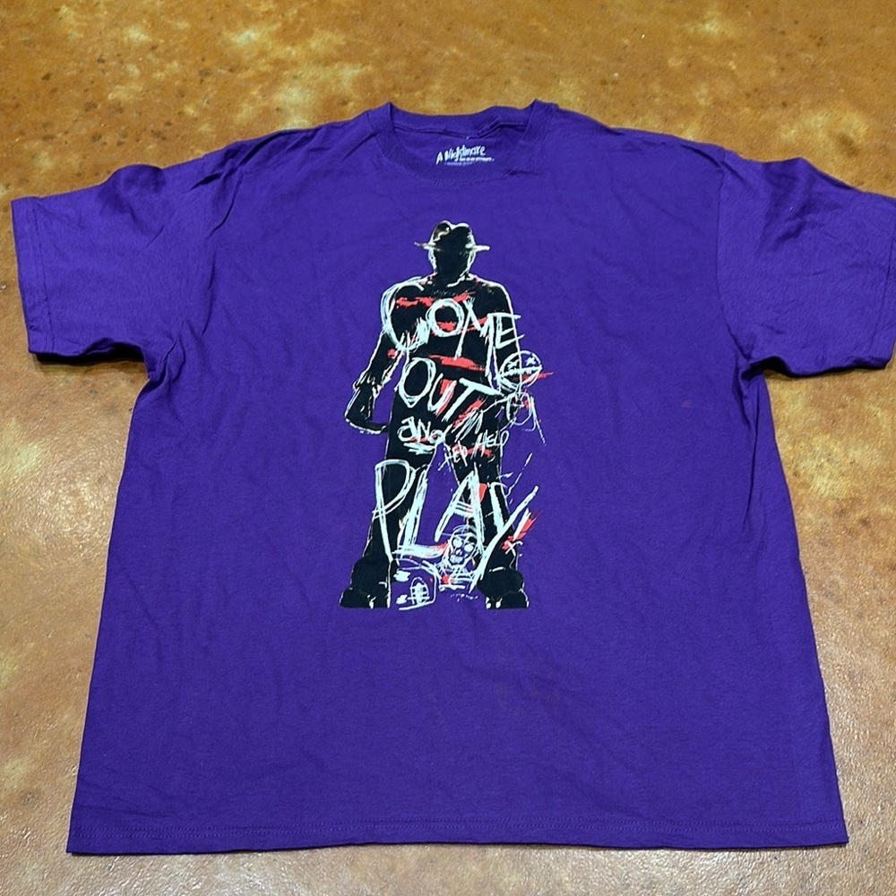 NWOT Purple licensed Graphic Men's or Women’s Shirt. Size xl